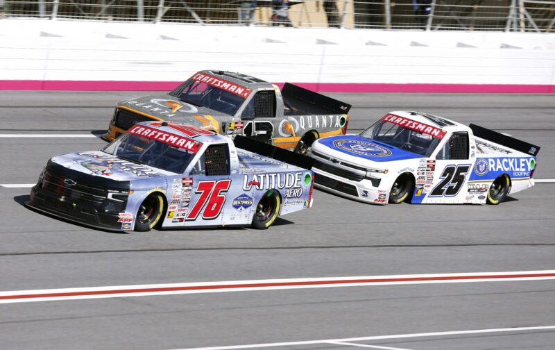 Spencer Boyd, driver of the #76 Latitude Aero Chevrolet, Jake Garcia, driver of the #13 Quanta Services Ford, and Ty Dillon, driver of the #25 Rackley Roofing Chevrolet, race during the NASCAR Craftsman Truck Series Fr8 208 at Atlanta Motor Speedway on February 24, 2024 in Hampton, Georgia. (Photo by Todd Kirkland/Getty Images) | Getty Images